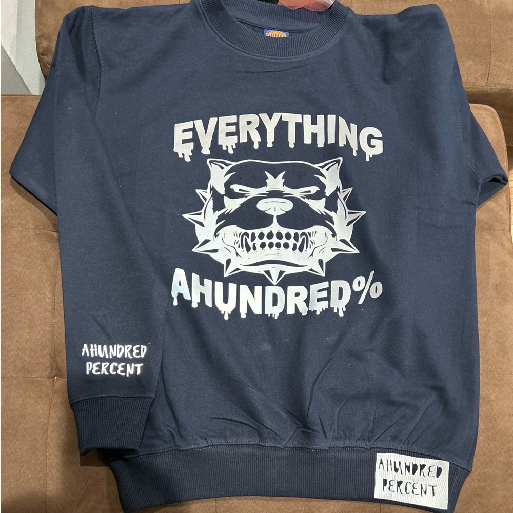 Unisex Sweatshirt custom made. Navy with grey reflective lettering. Size medium.